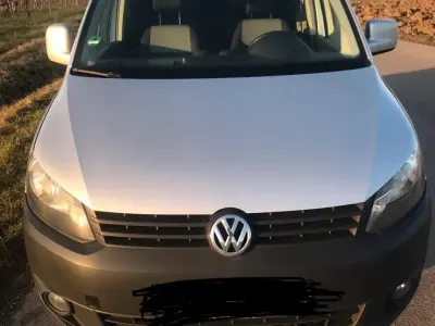 Second-hand VW Caddy 105 CP (77 kW) 2011 Argintiu Monovolum