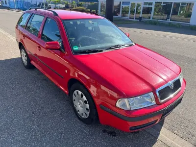 Używany Skoda Octavia 90 KM (66 kW) 2004 Czerwony Kombi