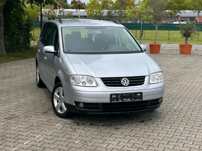 Używany VW Touran 115 KM (84 kW) 2003 Srebrny Minivan