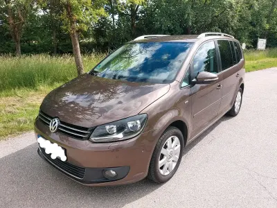 Gebraucht VW Touran Life 105 PS (77 kW) 2013 Braun Van / Kleinbus