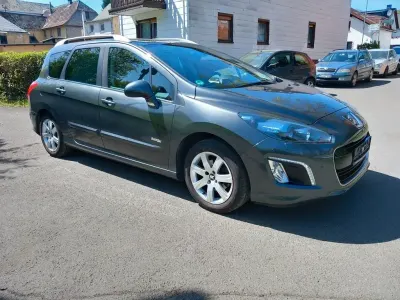 Occasion Peugeot 308 SW 114 PK (83 kW) 2014 Grijs Stationwagen