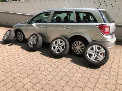 Second-hand Opel Astra Eco 110 CP (80 kW) 2010 Argintiu Break