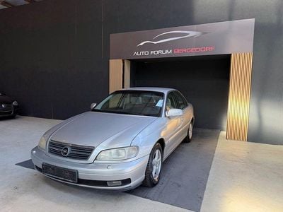 Second-hand Opel Omega 144 CP (105 kW) 2000 Argintiu Berlinǎ