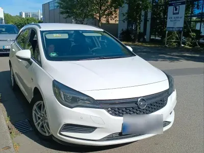 Gebraucht Opel Astra 102 PS (75 kW) 2017 Weiß Kombi