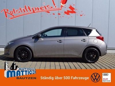 Gebraucht Toyota Auris Hybrid 136 PS (100 kW) 2014 Avantgarde bronze metallic (metallic) Limousine