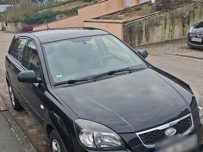 Second-hand Kia Rio Attract 100 CP (73 kW) 2010 Negru Hatchback