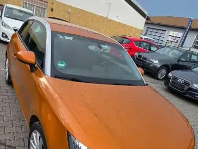 Gebraucht Audi A1 Attraction 90 PS (66 kW) 2014 Samoaorange metallic Kleinwagen