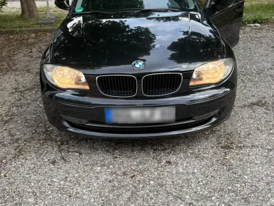 Gebraucht BMW 116 122 PS (89 kW) 2011 Schwarz Kleinwagen