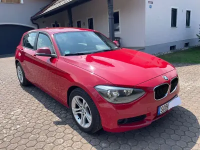 Gebraucht BMW 114 102 PS (75 kW) 2012 Rot Kleinwagen
