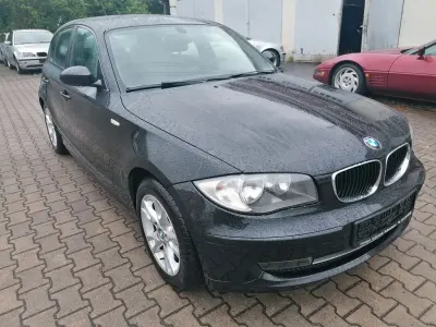 Gebraucht BMW 116 122 PS (89 kW) 2009 Schwarz Kleinwagen