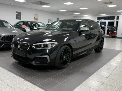 Begagnad BMW M135 Performance 326 HK (239 kW) 2015 Svart Halvkombi