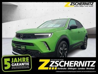 Gebraucht Opel Mokka-e Elegance 100 kW (136 PS) 2022 Matcha green/ikone gruen SUV