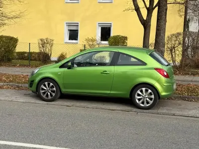 Gebraucht Opel Corsa 85 PS (62 kW) 2013 Grün Kleinwagen