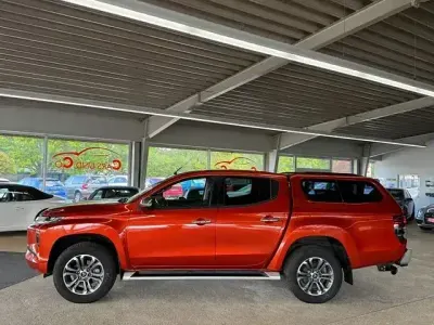 Gebraucht Mitsubishi L200 Top 150 PS (110 kW) 2021 Orange Pickup