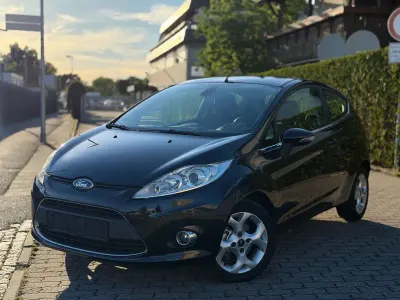 Gebraucht Ford Fiesta Titanium 95 PS (69 kW) 2010 Pantherschwarz metallic Kleinwagen