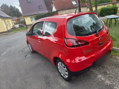 Gebraucht Mitsubishi Colt 75 PS (55 kW) 2009 Rot Kleinwagen