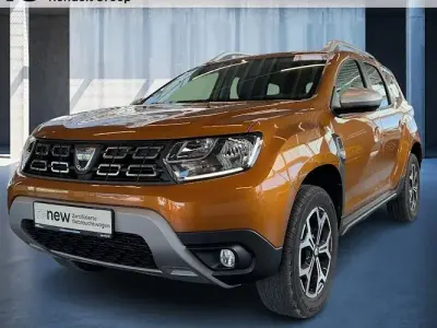 Używany Dacia Duster Adventure 150 KM (110 kW) 2019 Pomarańczowy SUV