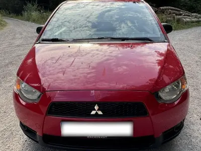 Gebraucht Mitsubishi Colt 75 PS (55 kW) 2013 Rot Kleinwagen