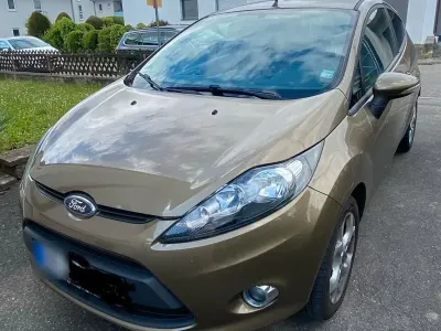 Gebraucht Ford Fiesta Trend 82 PS (60 kW) 2011 Braun Limousine