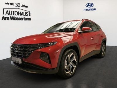 Gebraucht Hyundai Tucson Basis 265 PS (194 kW) 2023 Sunset red / mic (rot) SUV