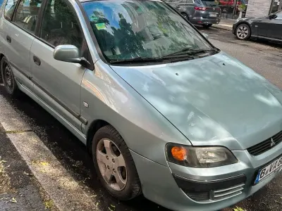 Begagnad Mitsubishi Space Star 98 HK (72 kW) 2004 Grön Minibuss