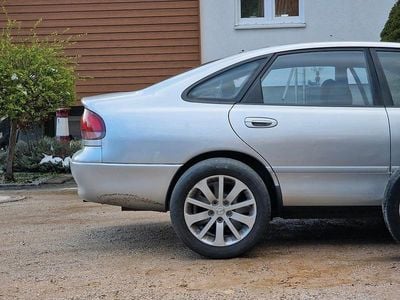 Second-hand Mazda 626 90 CP (66 kW) 1995 Argintiu Berlinǎ