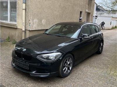 Second-hand BMW 114 Sport Line 105 CP (77 kW) 2013 Negru Hatchback