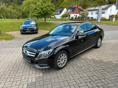Używany Mercedes C180 Avantgarde 156 KM (114 kW) 2014 Czarny Sedan/Limuzyna