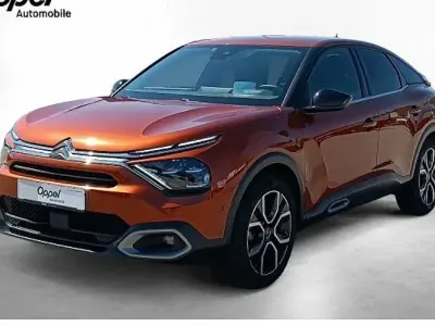 Używany Citroën e-C4 Shine 100 kW (136 KM) 2022 Pomarańczowy Sedan/Limuzyna