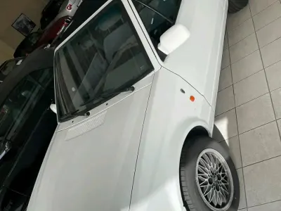 Gebraucht Ford Escort Cabriolet 75 PS (55 kW) 1990 Weiß Cabrio