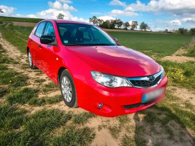 Gebraucht Subaru Impreza 107 PS (78 kW) 2009 Rot Kleinwagen
