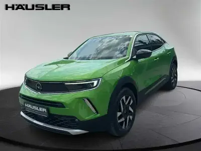 Gebraucht Opel Mokka Elegance 131 PS (96 kW) 2022 Matcha grün (metallic) SUV