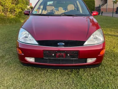 Occasion Ford Focus Ghia 101 ch (74 kW) 1999 Rouge Berline
