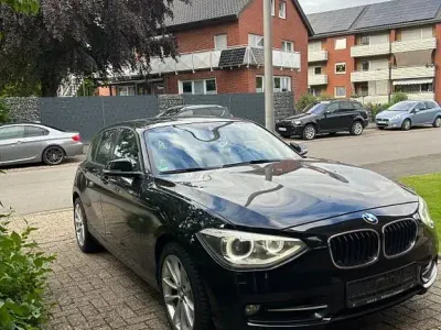 Gebraucht BMW 118 Sport Line 170 PS (125 kW) 2011 Schwarz Kleinwagen