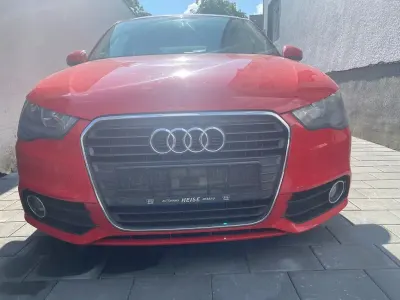 Używany Audi A1 Ambition 86 KM (63 kW) 2011 Czerwony Hatchback