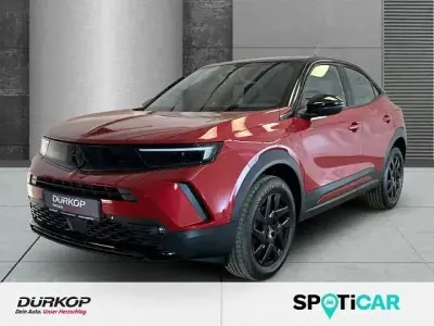 Gebraucht Opel Mokka GS Line 131 PS (96 kW) 2023 Kosmos rot (metallic) SUV
