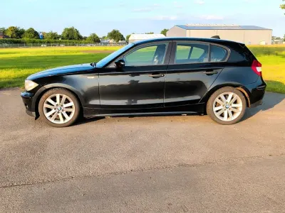 Gebraucht BMW 116 122 PS (89 kW) 2006 Schwarz Kleinwagen