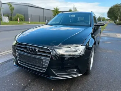 Używany Audi A4 Ambition 163 KM (119 kW) 2014 Czarny Kombi