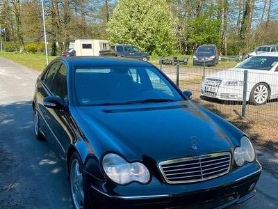 Second-hand Mercedes C180 AMG 143 CP (105 kW) 2004 Negru Berlinǎ