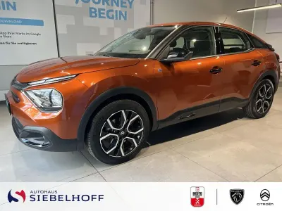 Używany Citroën e-C4 Feel 100 kW (136 KM) 2023 Brązowy Sedan/Limuzyna