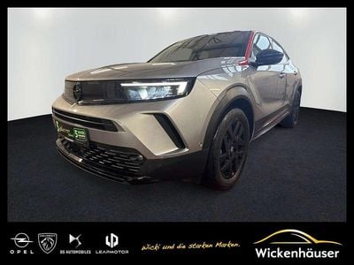 Gebraucht Opel Mokka-e GS Line 100 kW (136 PS) 2022 Kontrast grau/quarz silber SUV