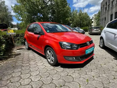 Gebraucht VW Polo Match 69 PS (50 kW) 2012 Hot orange Kleinwagen