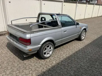 Używany Mazda 323 60 KM (44 kW) 1988 Srebrny Kabriolet