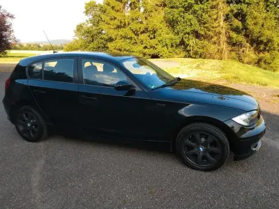 Gebraucht BMW 116 122 PS (89 kW) 2009 Schwarz Kleinwagen