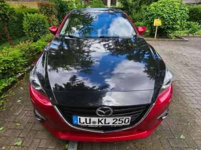 Używany Mazda 3 Sports-Line 150 KM (110 kW) 2014 Czerwony Sedan/Limuzyna
