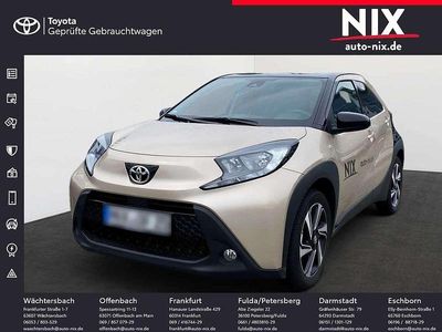 Ginger beige metallic/ night sky black Gebraucht 2024 Toyota Aygo X Team SUV | 15.850 € (Fairer Preis)