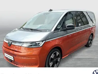 Używany VW Multivan Style 150 KM (110 kW) 2023 Pomarańczowy Minivan