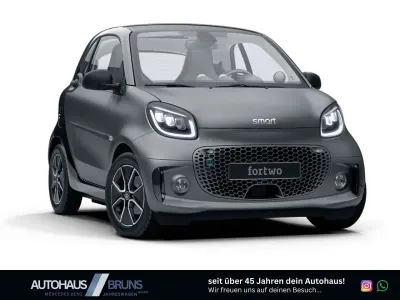 Gebraucht Smart ForTwo Coupé Exclusive 60 kW (82 PS) 2024 Bodypanels titania grey matt Kleinwagen