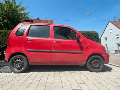 Używany Opel Agila 60 KM (44 kW) 2006 Czerwony Hatchback