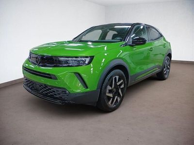 Gebraucht Opel Mokka GS Line 136 PS (100 kW) 2024 Lackierung matcha green/typ au SUV